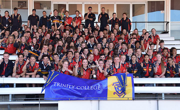 Cheering on the Trinity College Athletics team
