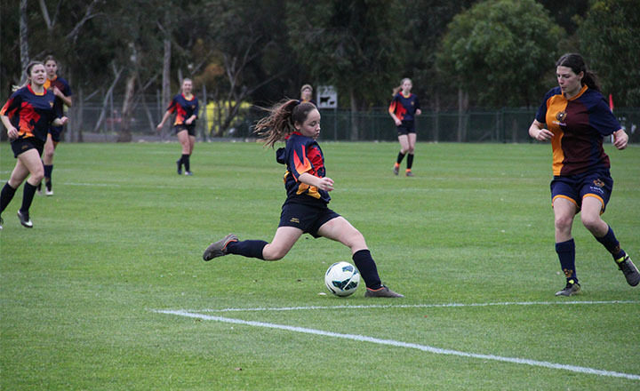 Trinity girls soccer player.