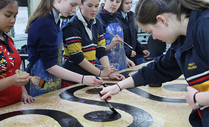 Visual Art and Design students painting at Trinity College