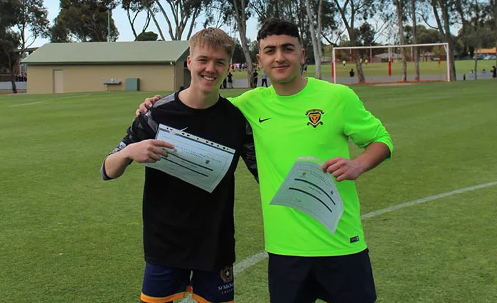 Soccer Medal Winners Flynn Martin (SMC) and Vincent Barbaro (TC).