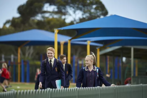 Smiling students commencing new school term