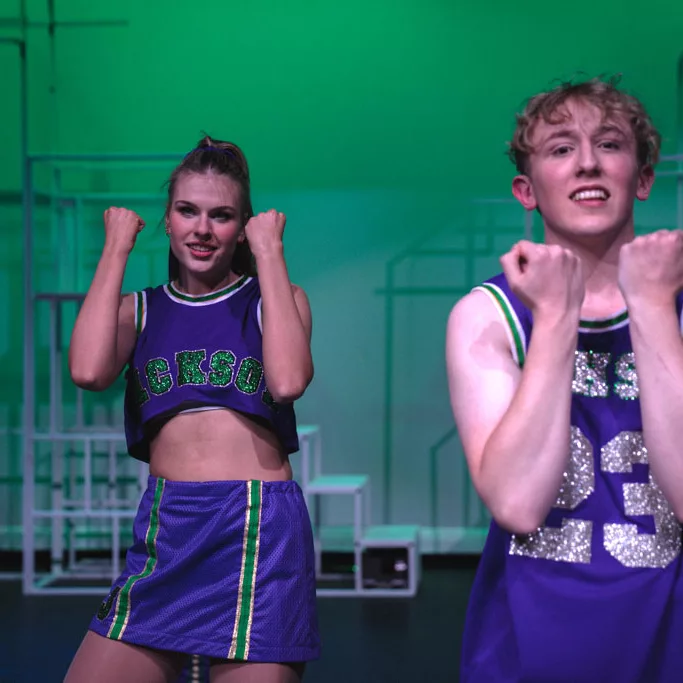 Male & female students performing during the 2023 College Musical “Bring it On”