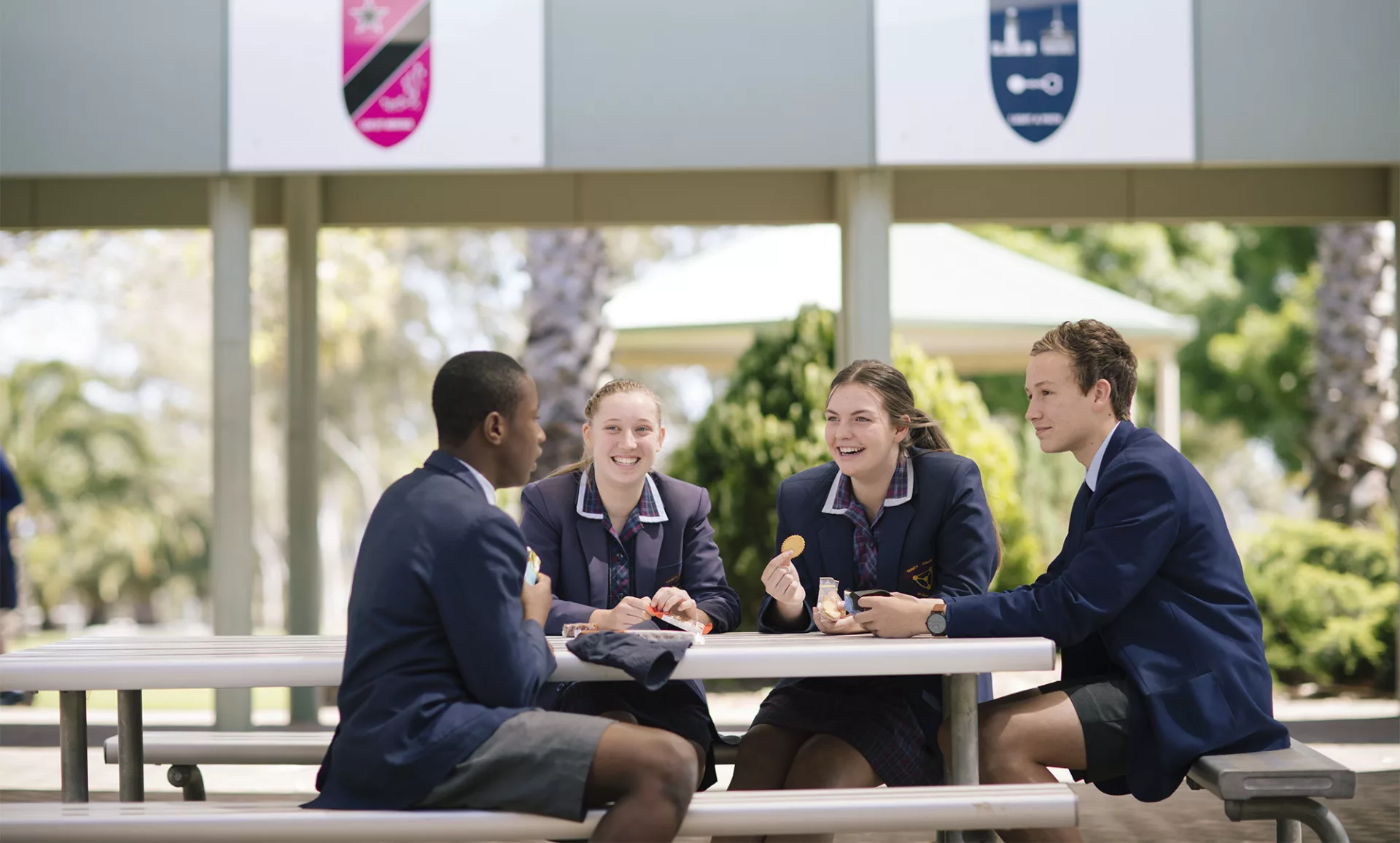 Trinity College middle school student sitting together